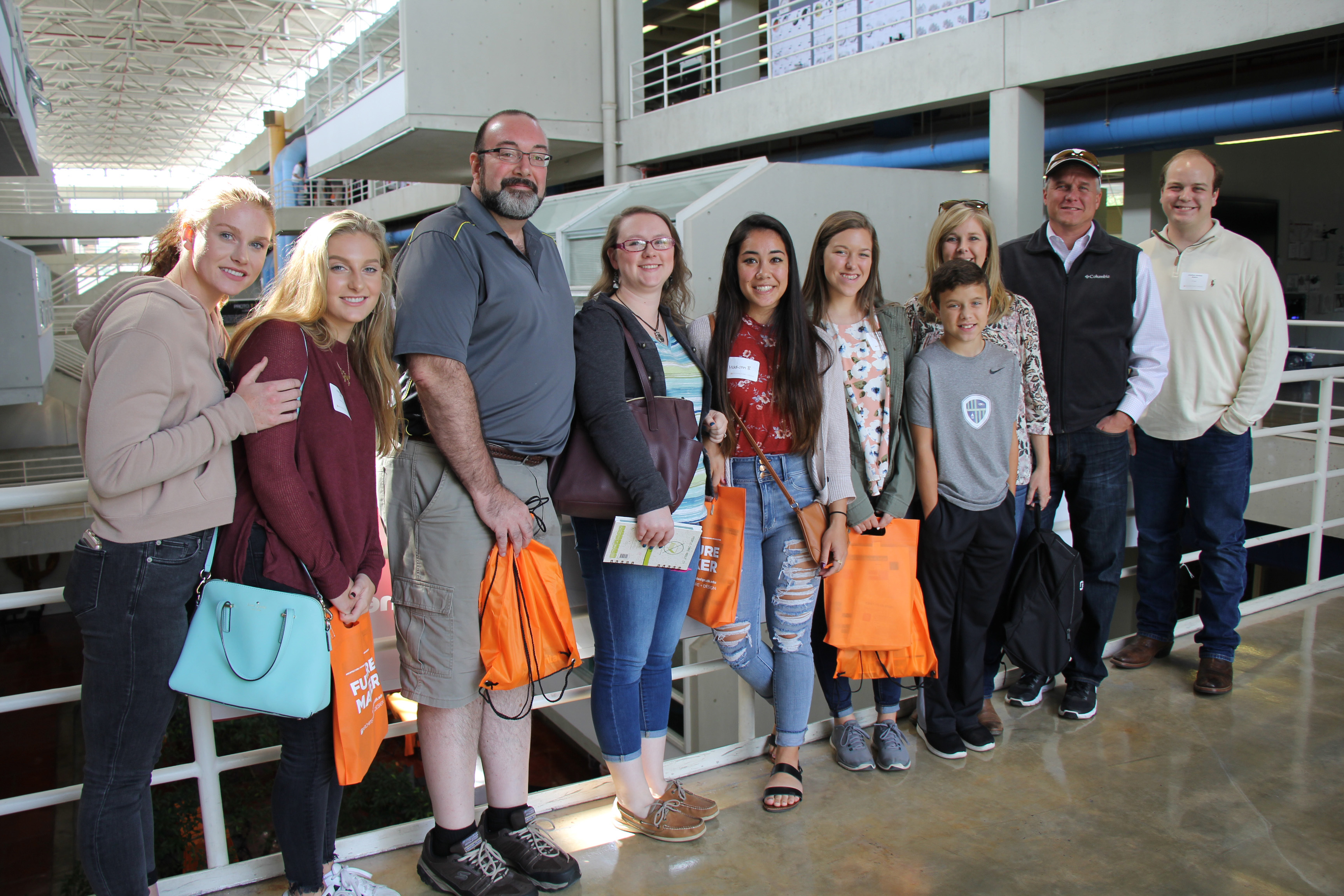 Parents, prospective students, and siblings tour the Art + Architecture Building.