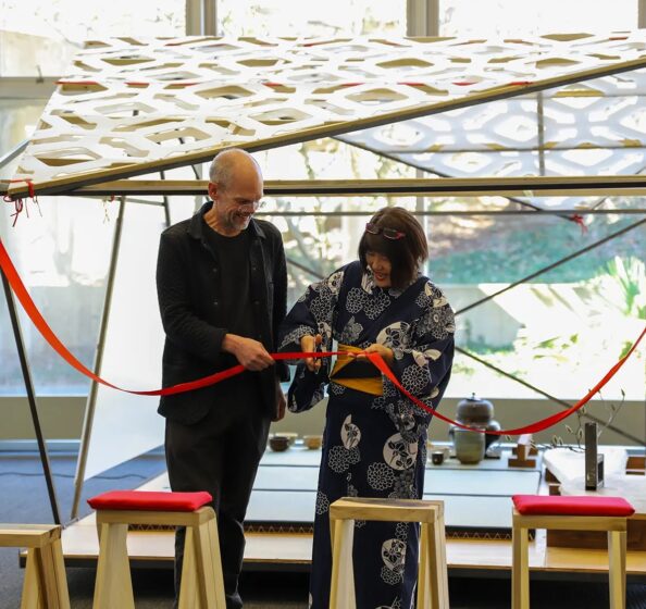 Professor David Matthews and Knoxville Asian Festival Executive Director Kumi Alderman cut the ribbon on the mobile teahouse.
